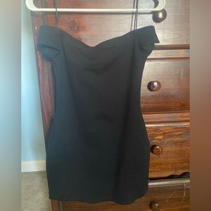 Black short dress. Off the shoulder.